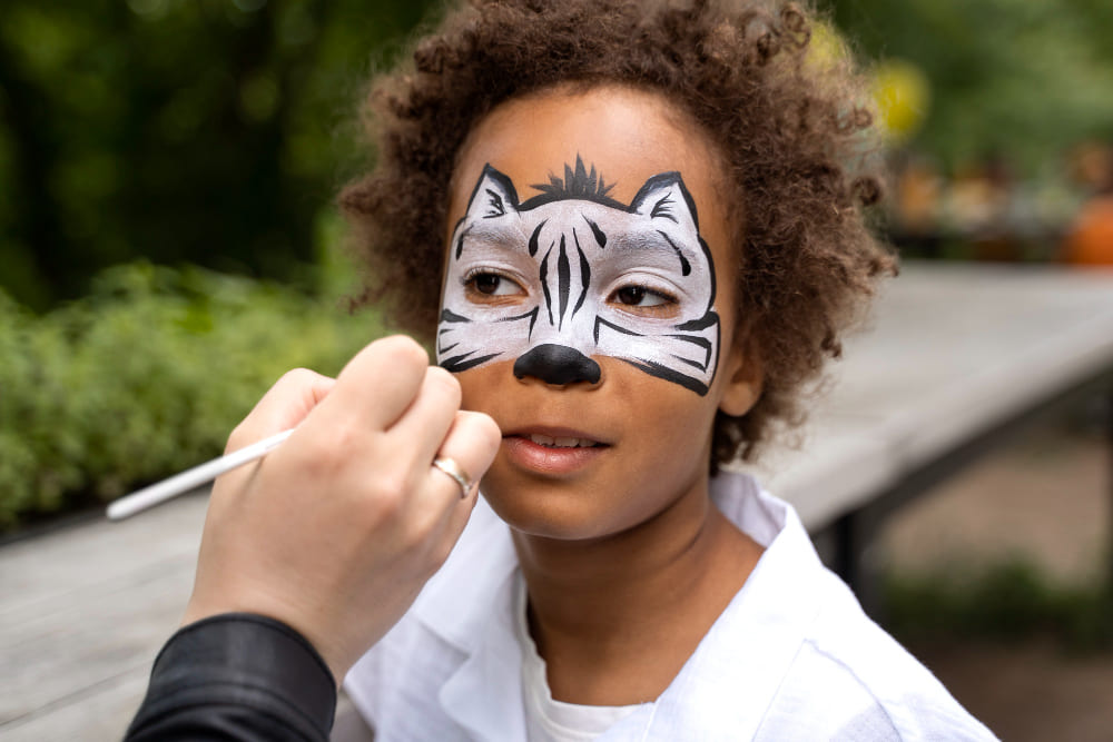 pintacaras tigre maquillaje Anima'ns Animación infantil para eventos, bodas, comuniones...